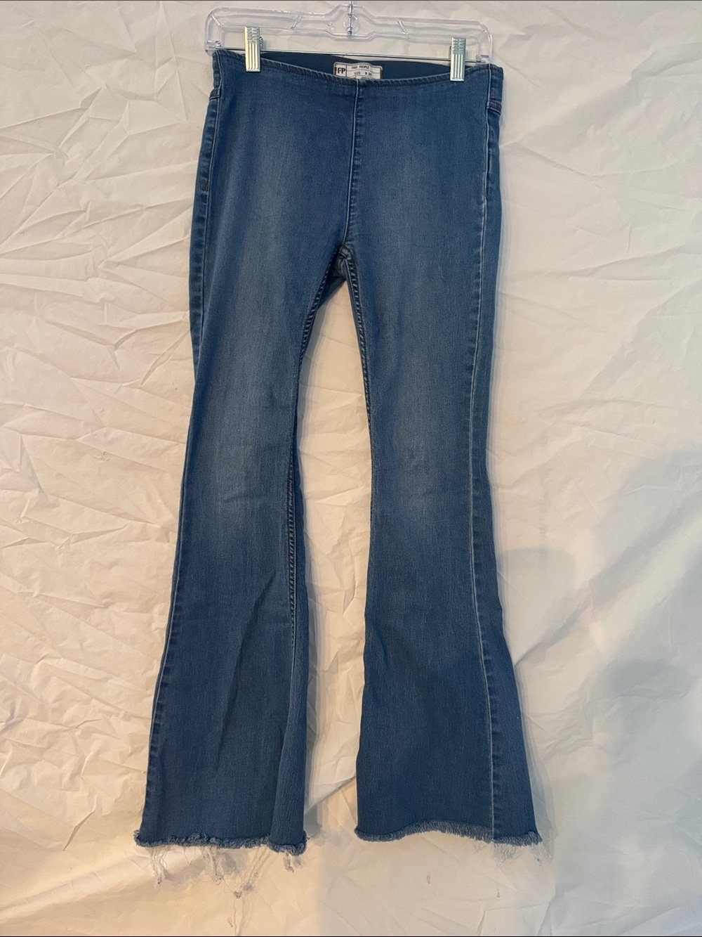 Free People Pull On Dark Blue Flare Jeans with Raw Hem